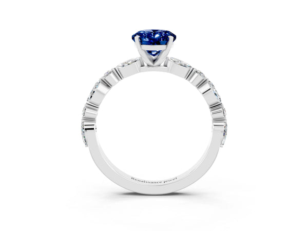 Platinum Oval Cut Blue Sapphire Ring with Marquise and Round  Side Stones and Four-Prong Setting