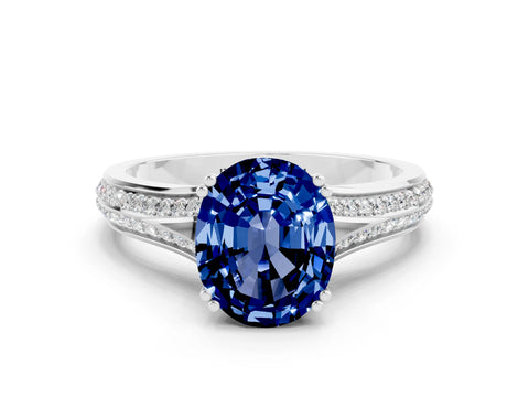 White gold Oval Cut Blue Sapphire Split Shank Engagement Ring with Pavé Band