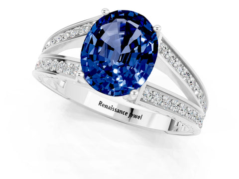 White gold Oval Cut Blue Sapphire Split Shank Ring with Pavé Band and Four-Prong Setting_1