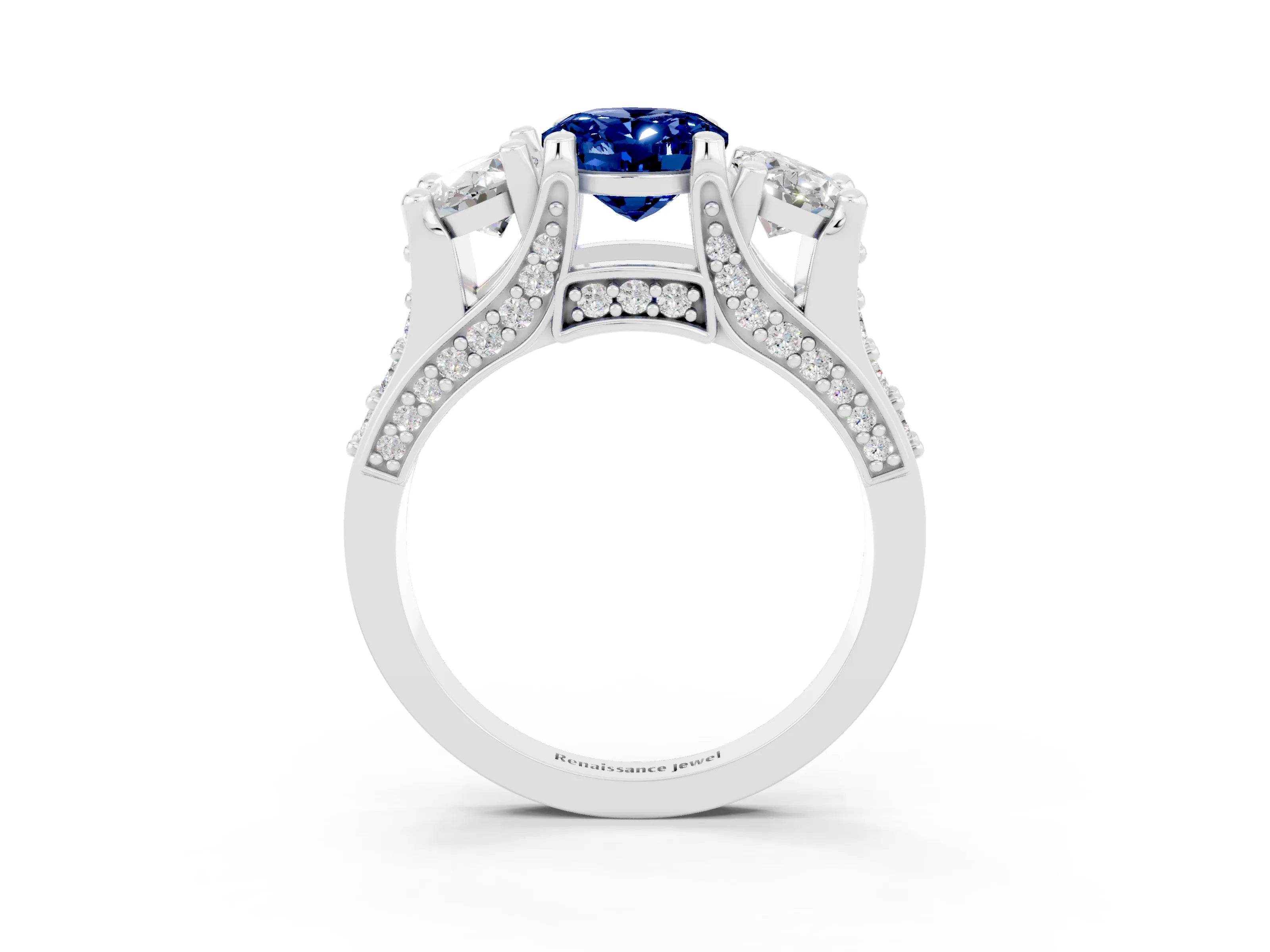White gold Oval Cut Blue Sapphire Three-Stone Ring with Channel Set Band and Four-Prong Setting_3