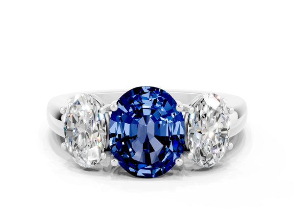 Silver Oval Cut Blue Sapphire Three-Stone Ring with Four-Prong Setting and Classic Band