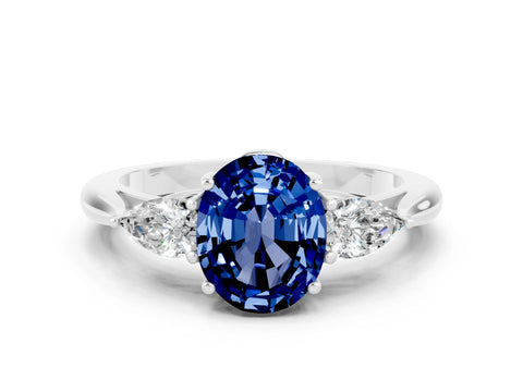 White gold Oval Cut Blue Sapphire Three-Stone Ring with Pear Side Stones and Four-Prong Setting_12