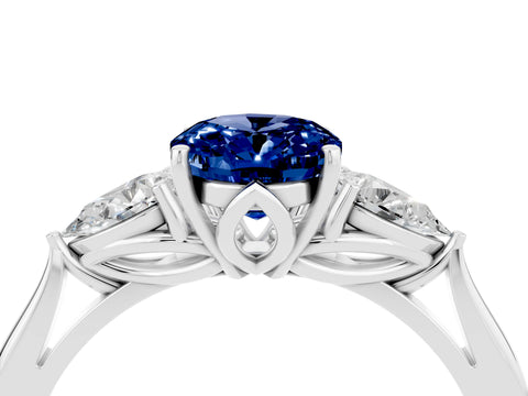 White gold Oval Cut Blue Sapphire Three-Stone Ring with Pear Side Stones and Four-Prong Setting_16