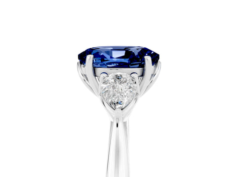 White gold Oval Cut Blue Sapphire Three-Stone Ring with Pear Side Stones and Four-Prong Setting_17