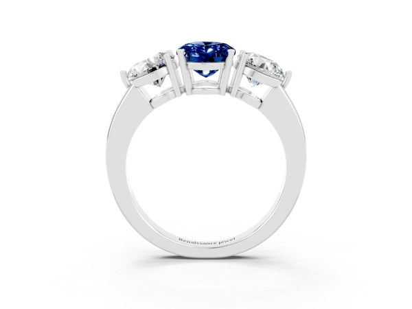 Silver Oval Cut Blue Sapphire Three-Stone Ring with Prong Setting and Classic Band