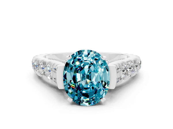 White gold Oval Cut Blue Topaz Classic Solitaire Ring with Pavé Band and Four-Prong Setting