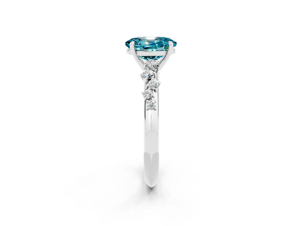 Platinum Oval Blue Topaz Graduated Cluster Solitaire Engagement Ring with Open Basket