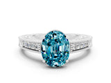 White gold Oval Cut Blue Topaz Engagement Ring with Milgrain Channel Set Band and Prong Setting