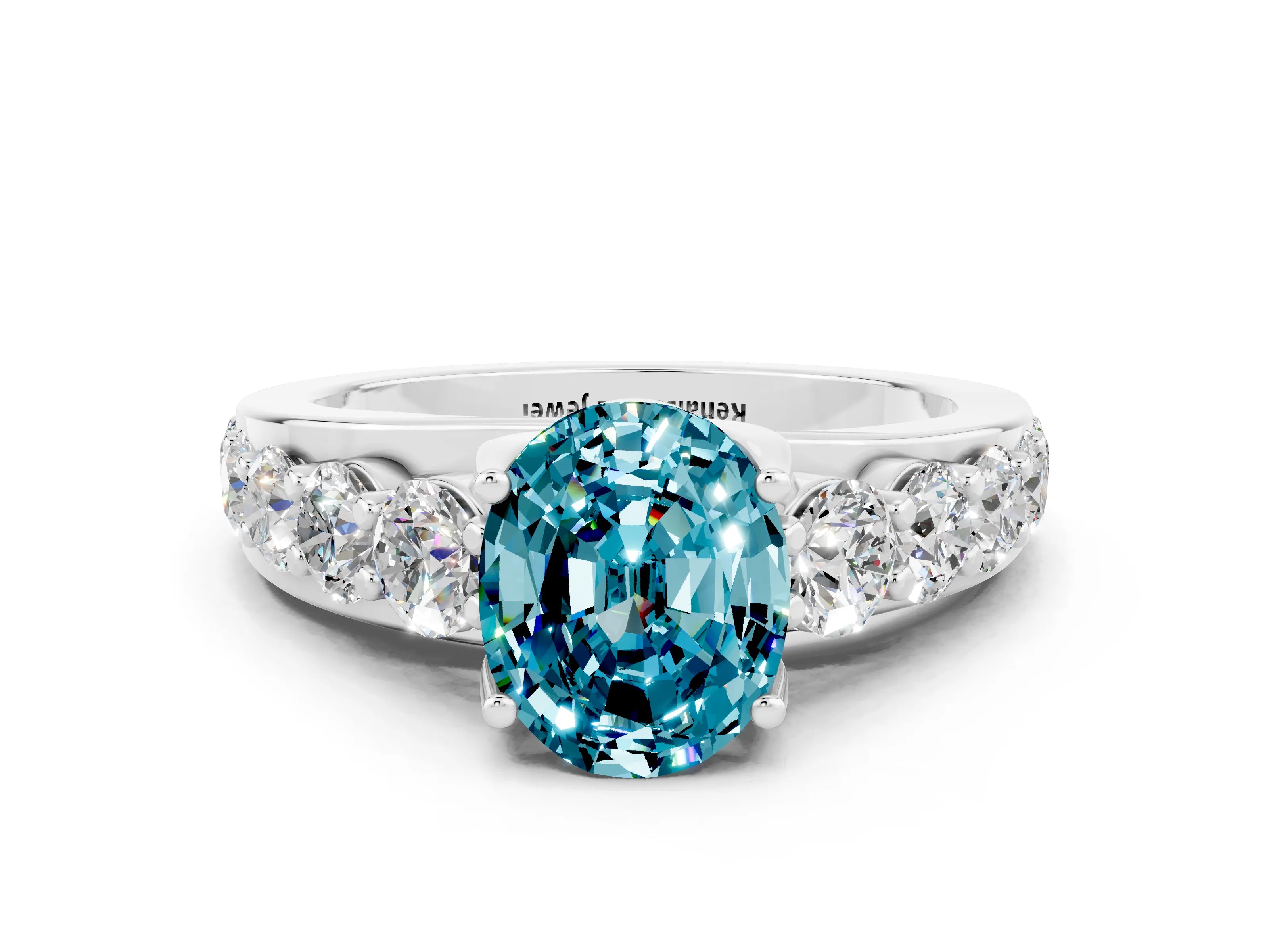 White gold Oval Cut Blue Topaz Engagement Ring with Pavé Band and Four-Prong Setting