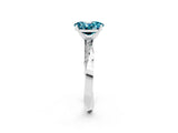 White gold Oval Cut Blue Topaz Engagement Ring with Side Stone Accents and Four-Prong Setting_74