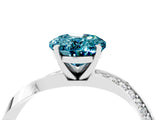 White gold Oval Cut Blue Topaz Engagement Ring with Side Stone Accents and Four-Prong Setting_76