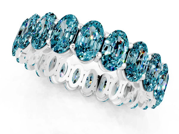 White gold Oval Cut Blue Topaz Eternity Band with Shared Prong Setting