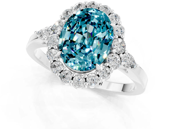 Silver Oval Cut Blue Topaz Halo Ring with Pear Side Stones and Prong Setting