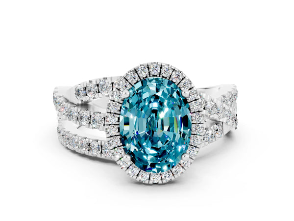 Platinum Oval Cut Blue Topaz Halo Ring with Round Split Shank and Prong Setting