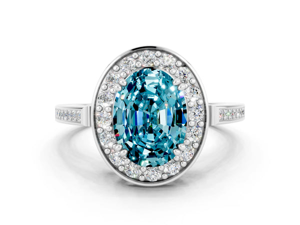 White gold Oval Cut Blue Topaz Halo Ring with Split Shank and Four-Prong Setting