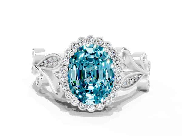 White gold Oval Cut Blue Topaz Halo Ring with Vintage Split Shank and Four-Prong Setting