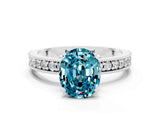 White gold Oval Cut Blue Topaz Milgrain Pavé Engagement Ring with Four-Prong Setting_12