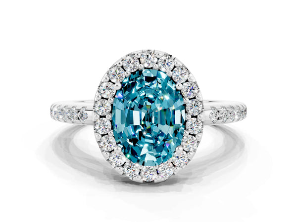 White gold Oval Cut Blue Topaz Pavé Halo Ring with Four-Prong Setting