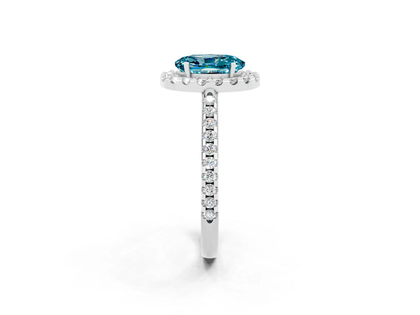 White gold Oval Cut Blue Topaz Pavé Halo Ring with Four-Prong Setting