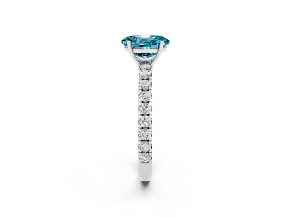 Platinum Oval Cut Blue Topaz Pavé Solitaire Engagement Ring with Four-Prong Setting