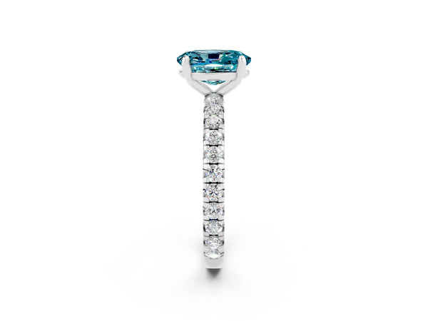 Silver Oval Cut Blue Topaz Pavé Solitaire Ring with Round Band and Prong Setting