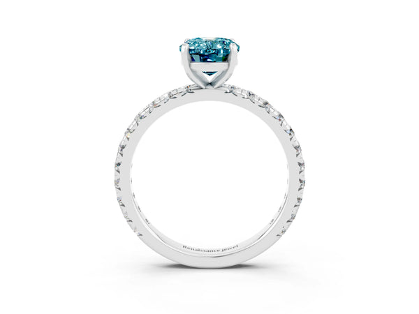 Platinum Oval Cut Blue Topaz Pavé Solitaire Ring with Round Band and Prong Setting