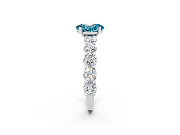 Platinum Oval Cut Blue Topaz Prong Setting with Side Stones on a Pave Band