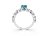 White gold Oval Cut Blue Topaz Prong Setting with Side Stones on a Pave Band_3
