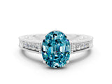 White gold Oval Cut Blue Topaz Ring with Milgrain Pavé Band and Four-Prong Setting_12