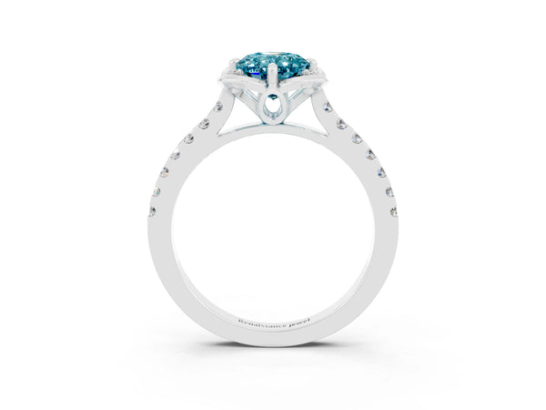 White gold Oval Cut Blue Topaz Ring with Pavé Band and Floral Prong Setting