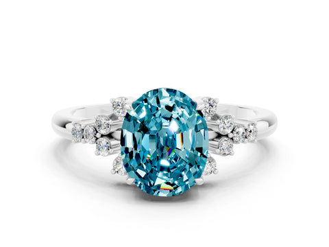 White gold Oval Cut Blue Topaz Ring with Side Stones and Four-Prong Setting_109