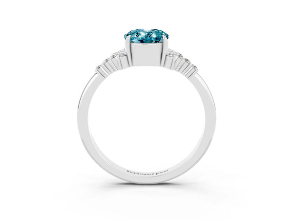 Silver Oval Cut Blue Topaz Ring with Side Stones and Four-Prong Setting