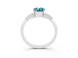 White gold Oval Cut Blue Topaz Ring with Side Stones and Four-Prong Setting_121