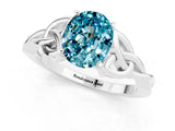 White gold Oval Cut Blue Topaz Solitaire Engagement Ring with Celtic Knot Band and Four-Prong Setting_1