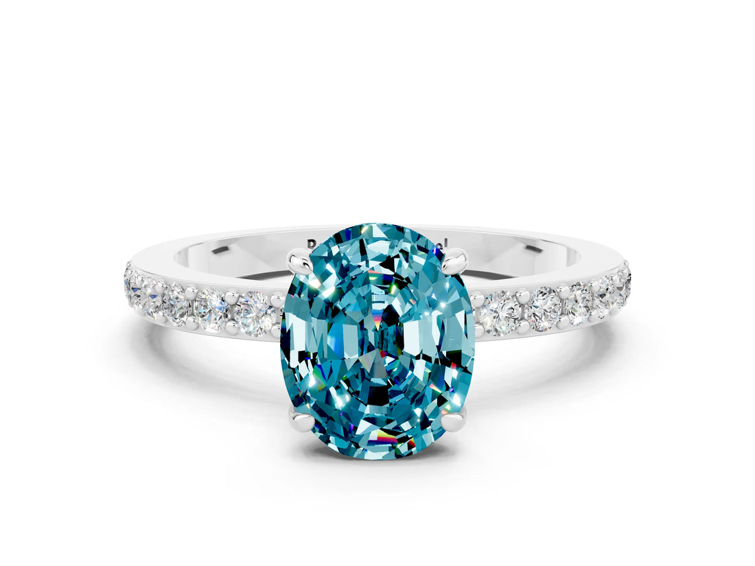 White gold Oval Cut Blue Topaz Solitaire Engagement Ring with Pavé Band and Four-Prong Setting_12