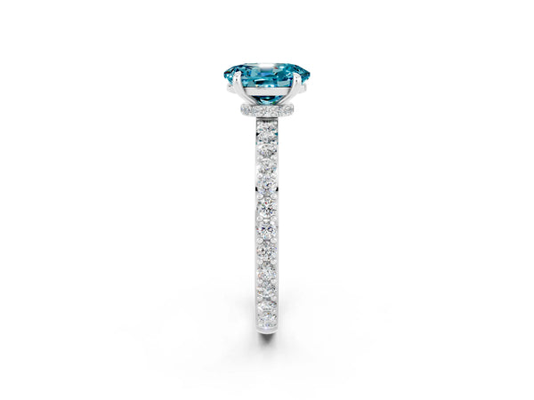Platinum Oval Cut Blue Topaz Solitaire Engagement Ring with Pavé Band and Four-Prong Setting