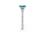 White gold Oval Cut Blue Topaz Solitaire Engagement Ring with Pavé Band and Four-Prong Setting_14