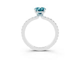 White gold Oval Cut Blue Topaz Solitaire Engagement Ring with Pavé Band and Four-Prong Setting_15