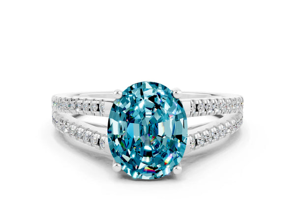 Platinum Oval Cut Blue Topaz Solitaire Engagement Ring with Split Shank Pavé Band