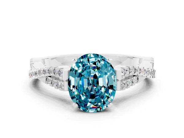 Platinum Oval Cut Blue Topaz Solitaire Engagement Ring with Twisted Pavé Band and Four-Prong Setting