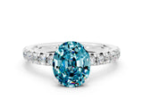 White gold Oval Cut Blue Topaz Solitaire Pavé Engagement Ring with Round Band and Prong Setting_12