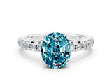 White gold Oval Cut Blue Topaz Solitaire Pavé Engagement Ring with Round Band and Prong Setting_72