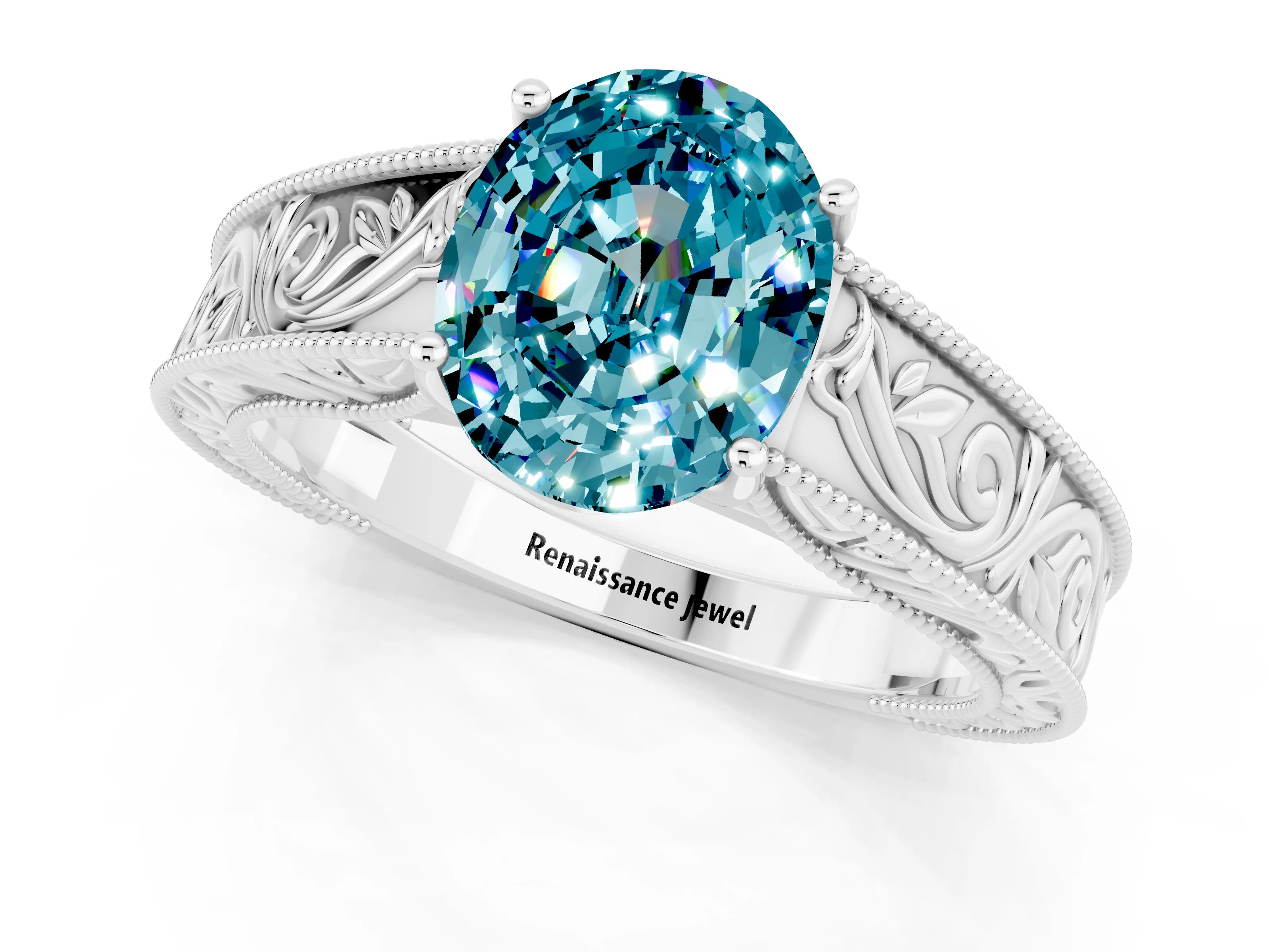 White gold Oval Cut Blue Topaz Solitaire Ring with Engraved Band and Four-Prong Setting_1