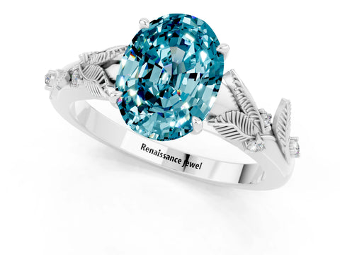 White gold Oval Cut Blue Topaz Solitaire Ring with Leaf Motif Band and Four-Prong Setting_1