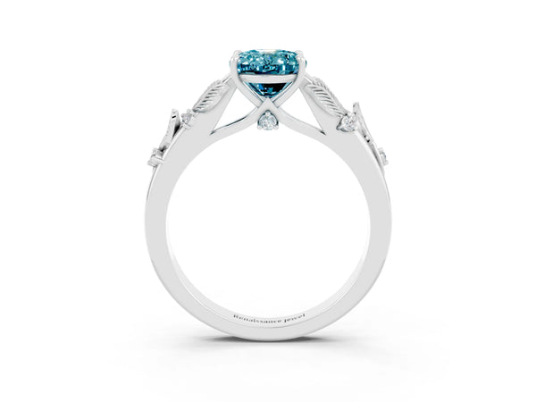 Silver Oval Cut Blue Topaz Solitaire Ring with Leaf Motif Band and Four-Prong Setting