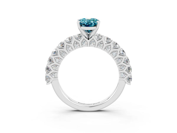 White gold Oval Cut Blue Topaz Solitaire Ring with Shared Prong Pavé Band and Four-Prong Setting
