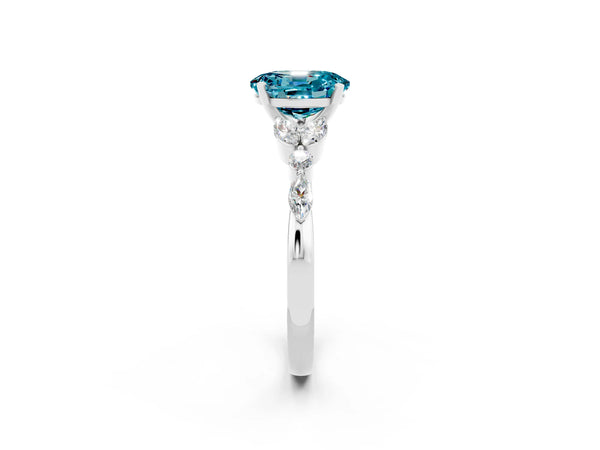 Silver Oval Cut Blue Topaz Solitaire Ring with Side Stones and Four-Prong Setting