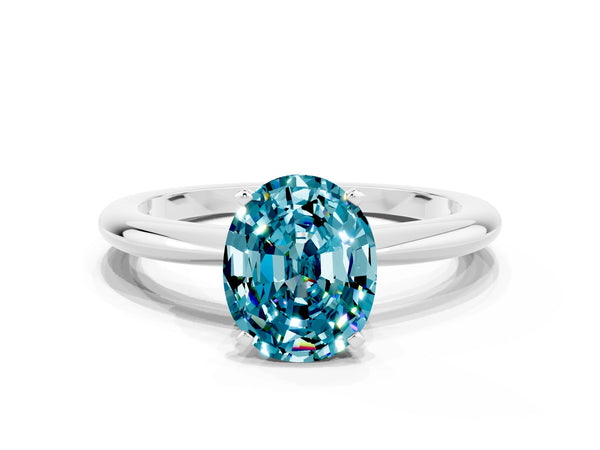 White gold Oval Cut Blue Topaz Solitaire Ring with Six-Prong Setting and Classic Band