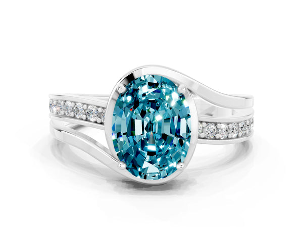 White gold Oval Cut Blue Topaz Solitaire Ring with Split Shank and Prong Setting
