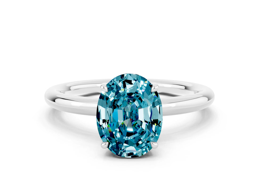 White gold Oval Cut Blue Topaz Solitaire Ring with Thin Band and Four-Prong Setting_12